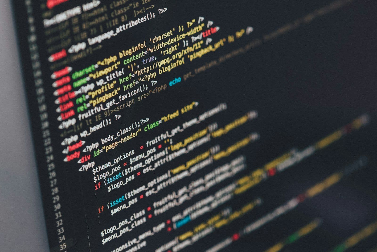 Web development workspace with code on screen — built by M&M, a marketing agency in Qatar